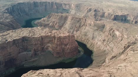 aerial view of impressive horseshoe bend meander, canyon of colorado river in arizona desert usa