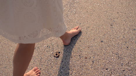 Woman walking on the sand
