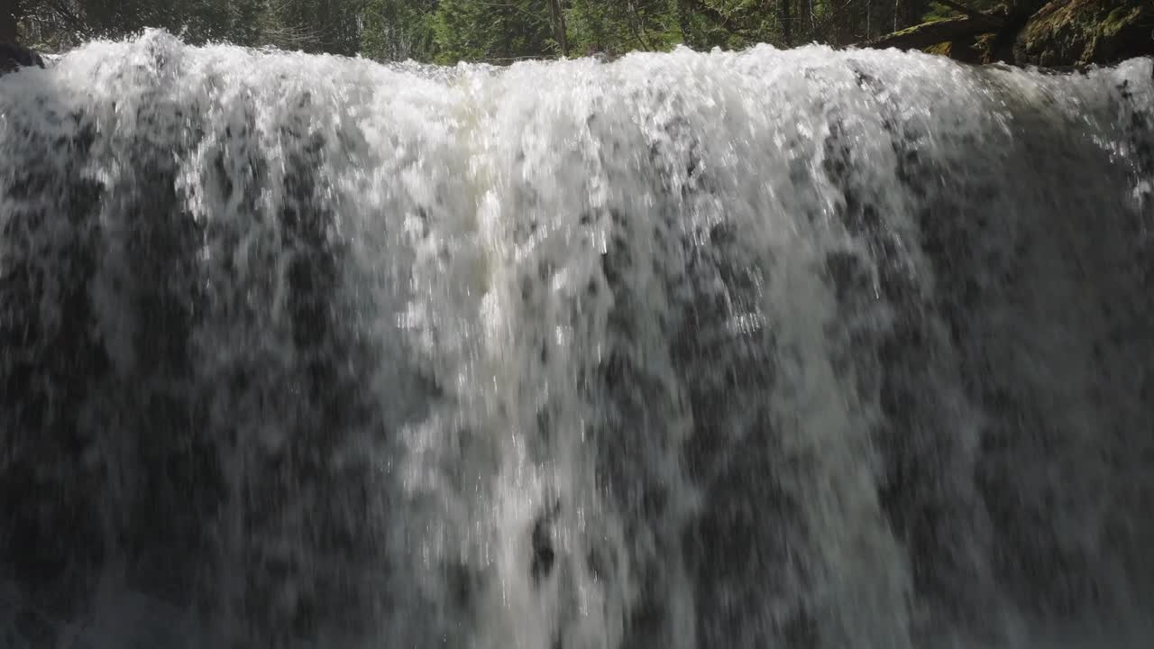 Water cascading over a waterfall in Owen Sound, Canada, creating a powerful and serene scene