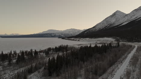 monochrome view along shores of destruction bay within kluane national park in yukon, canada. aerial shot