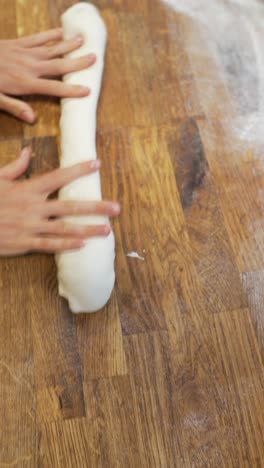 preparing dough on a wooden board