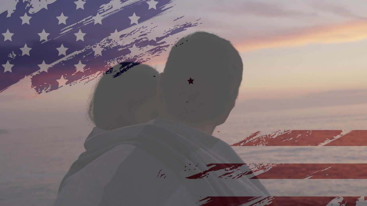 Embracing couple with American flag overlay, enjoying sunset outdoors together