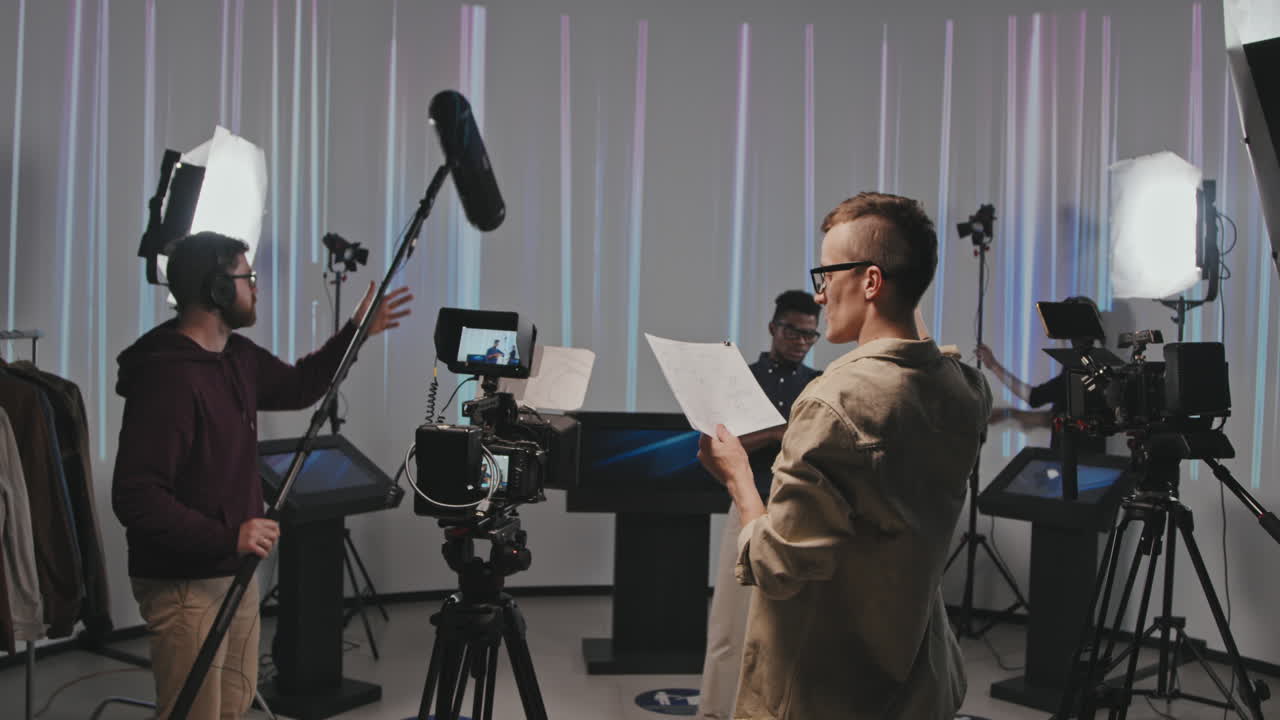 Operator With Storyboard Walking Into Filmmaking Studio