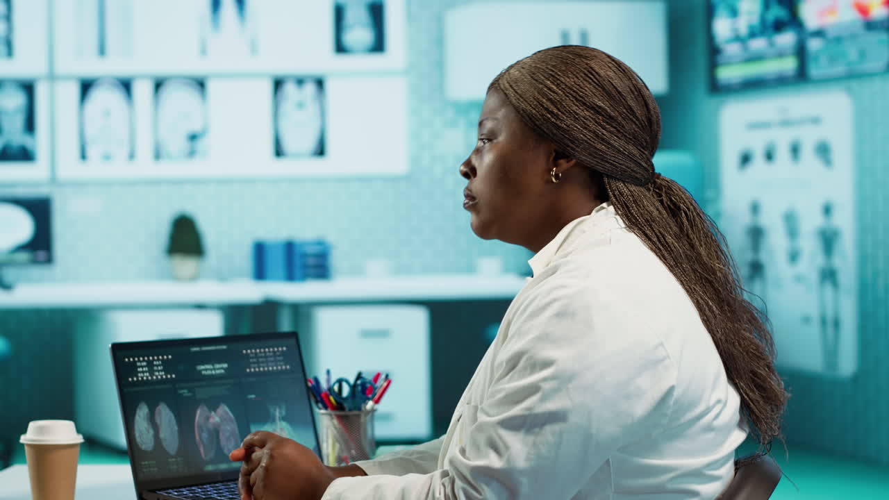 Black general practitioner and patient discussing health care diagnostics