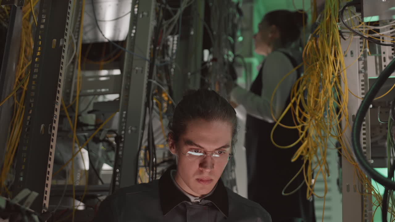 Technicians Working in Data Center