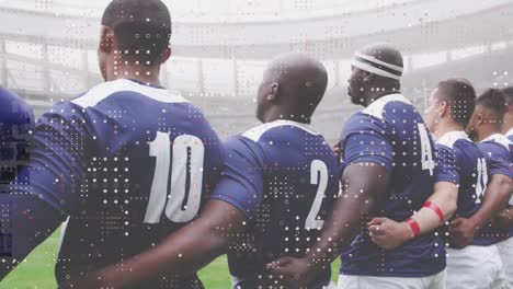 animation of spots over male rugby players during match at stadium