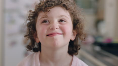 portrait beautiful happy girl smiling child with cute expression looking at camera enjoying childhood happiness