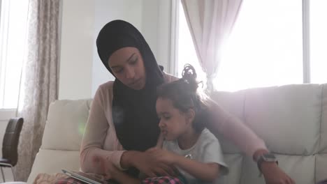 mother and daughter at home