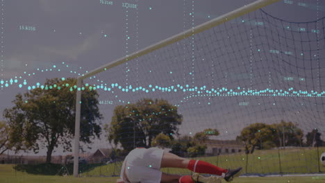 Diving soccer player saving goal with animation overlay in action-packed scene
