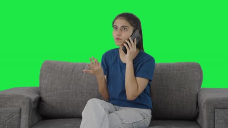 Angry-Indian-teenage-girl-shouting-on-call-Green-screen