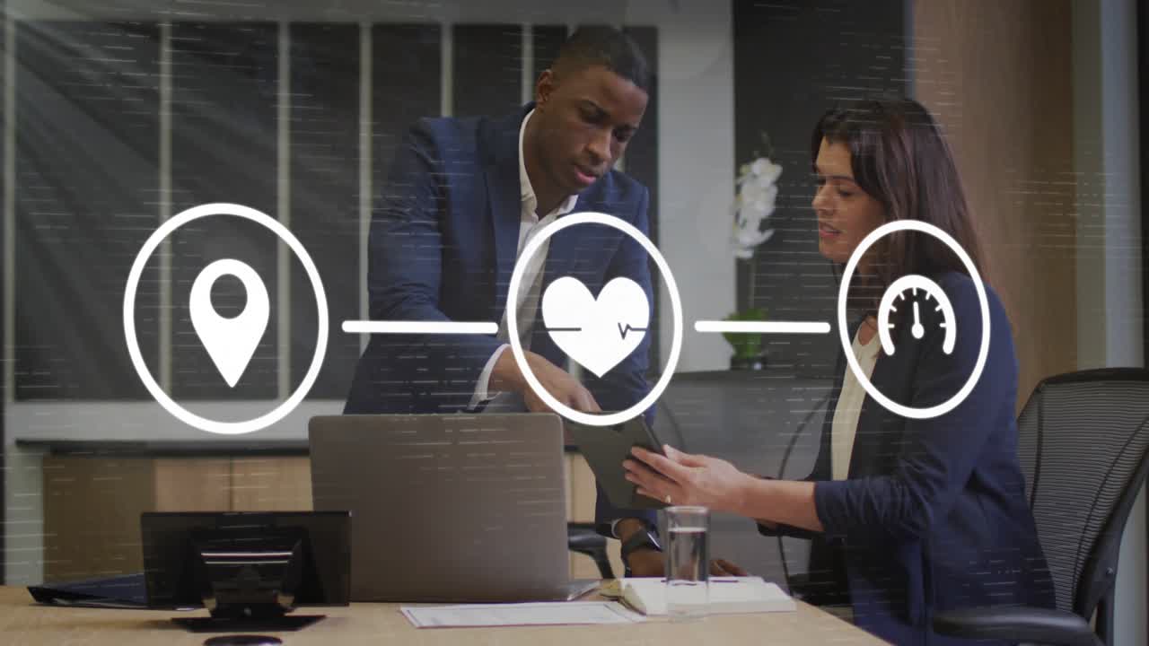 Two business colleagues reviewing tablet, woman tapping to navigate while icons animating metrics