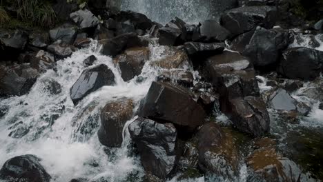 idyllic waterfall in cayambe coca national park in papallacta, ecuador - tilt up