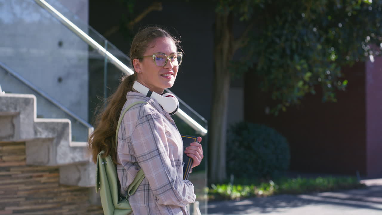 A woman on a college campus