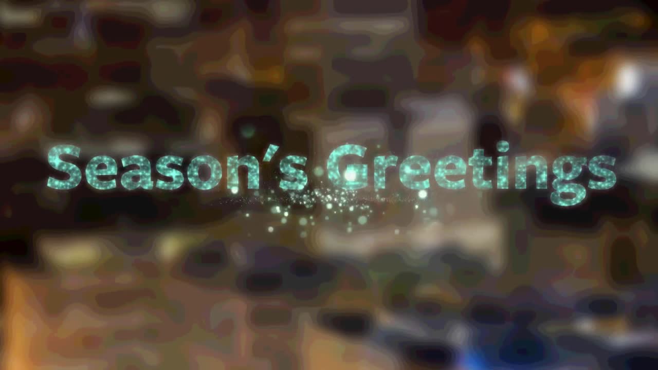 texto de saludo de las estaciones sobre fuegos artificiales estallando contra la vista aérea del paisaje urbano nocturno