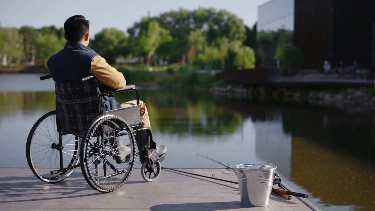 Disabled Man Fishing in Park