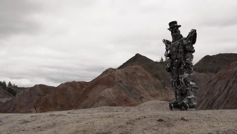 giant mechanical robot in a desert landscape