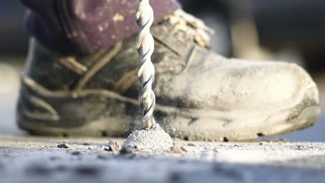 worker drilling concrete