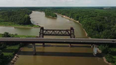 highway bridge in twin city riverfront park, arkansas, usa - aerial shot