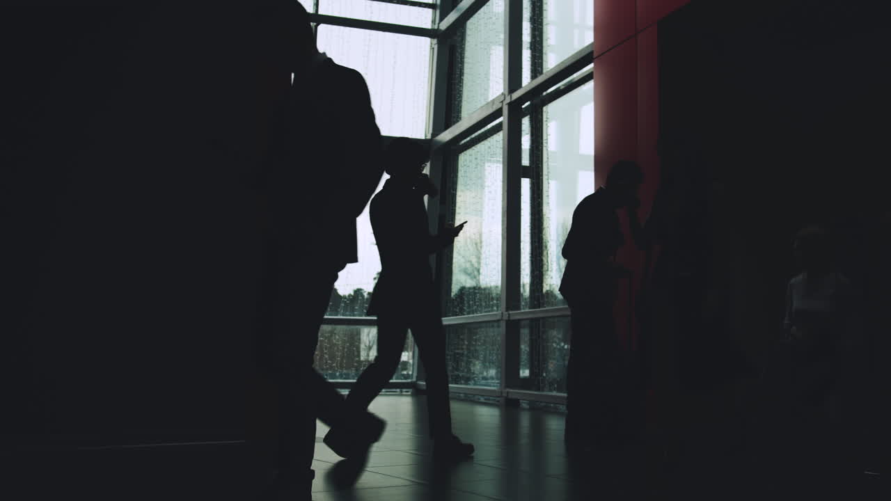 Business People in Modern Building Corridor