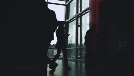 business people in modern building corridor