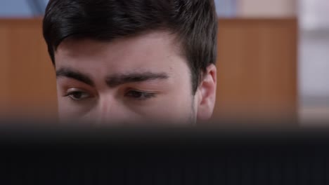 man working on a computer