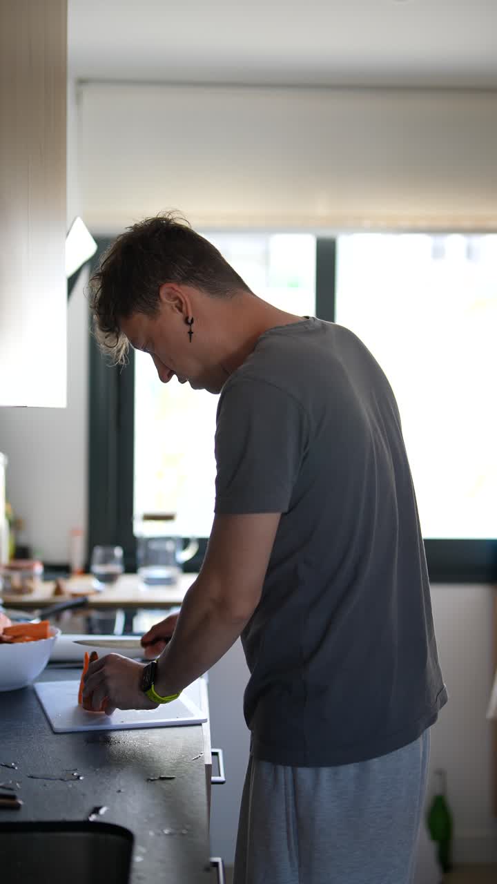 Man Preparing Food in Kitchen
