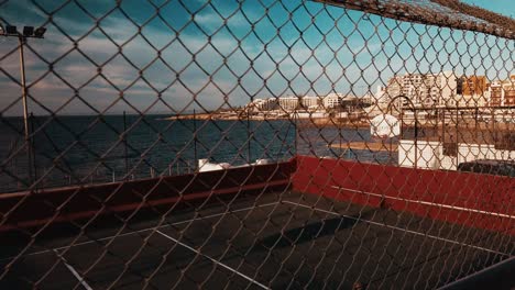 an empty basketball stadium on the coast of bugibba, malta.