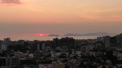 beautiful dusk seascape seen from miraflores district in lima peru, drone view