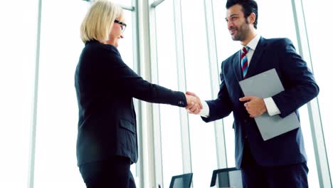 business people handshake with friend at office