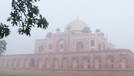 humayun tomb at misty morning from unique perspective shot is taken at delhi india