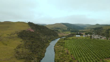 aerial drone footage acompaning a river