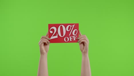 20-Percent-Off-advertisement-inscription-on-paper-sheet-in-womans-hands-on-chroma-key.-Slow-motion