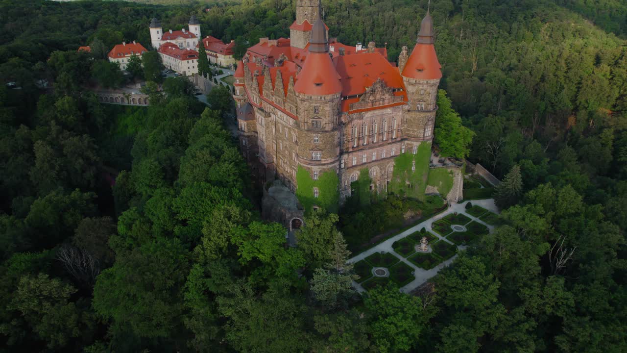 Aerial View of a Majestic Castle in a Forest