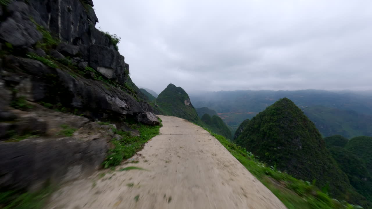 Adventure Motor Ride Across The Remote Mountainside Roads Of Ha Giang Loop In Vietnam. POV Shot