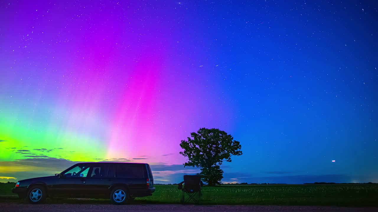Aurora Borealis Night Sky with Car, Observer, and Light Streaks