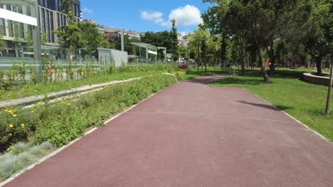 city park with red path