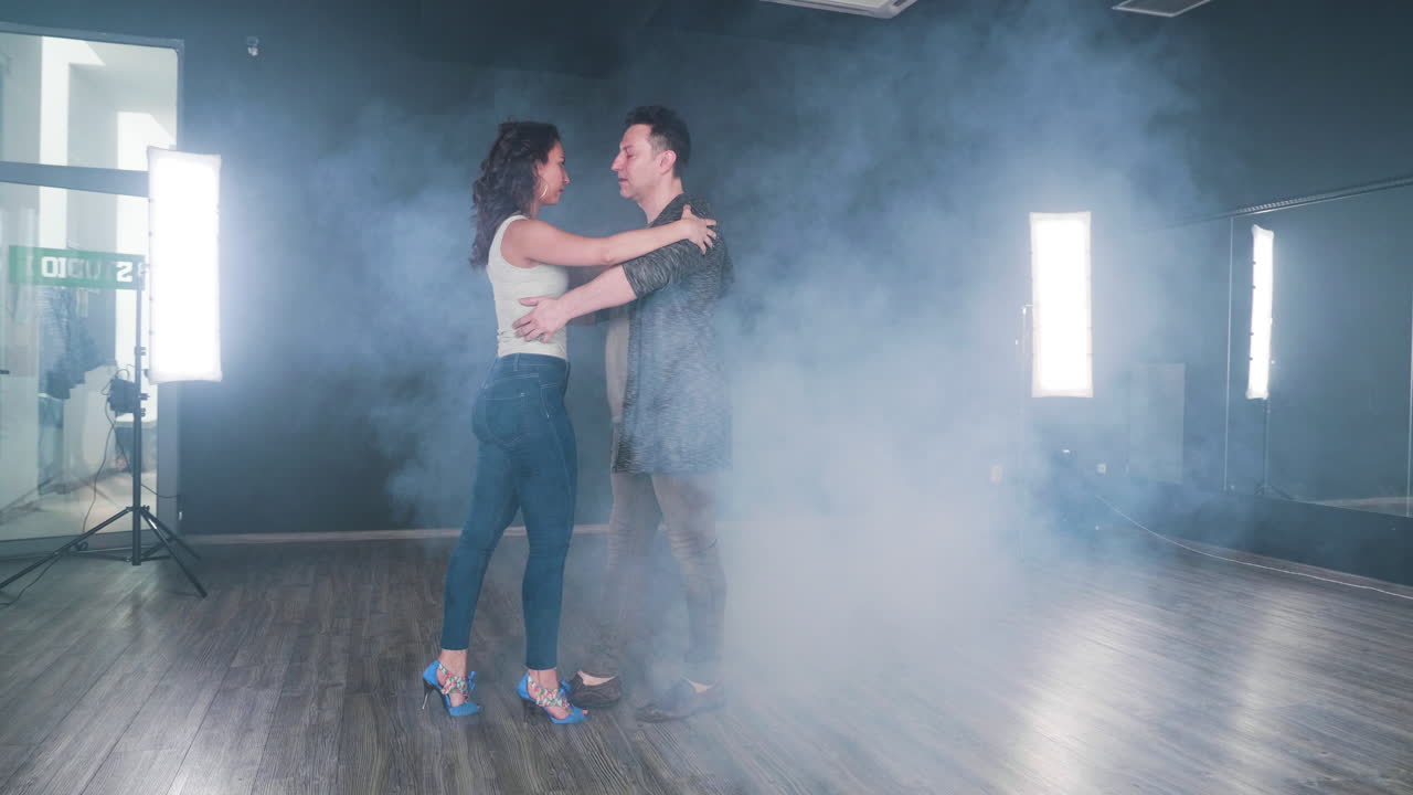 Dancing Couple in Studio with Smoke