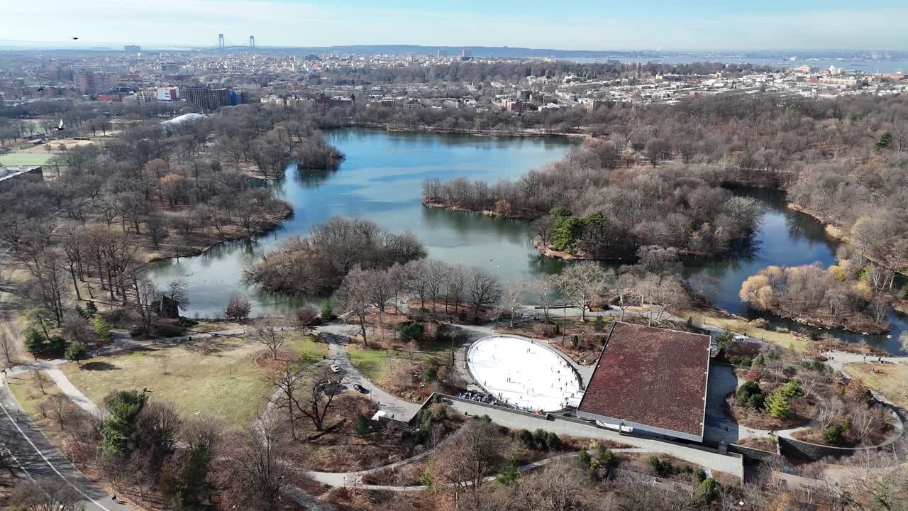 Vertical drone side-tracking shot over Ocean Ave in Brooklyn, highlighting New York’s dynamic skyline, charming streets, and vibrant urban architecture with smooth lateral motion.