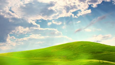 green hill in tuscany with clouds and sunrays in motion, 4k time-lapse