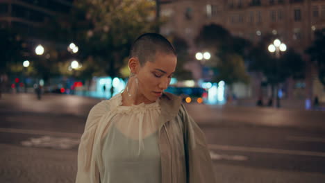 stylish woman in city night