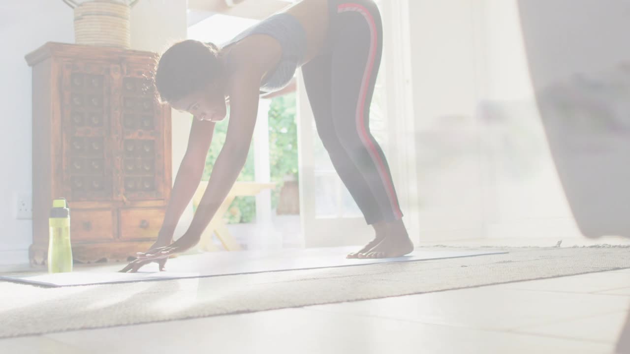 Mid-adult woman reaching to place hands on yoga mat, animated lines guiding fitness stretch
