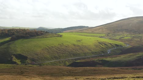 peak district valley with narrow winding road