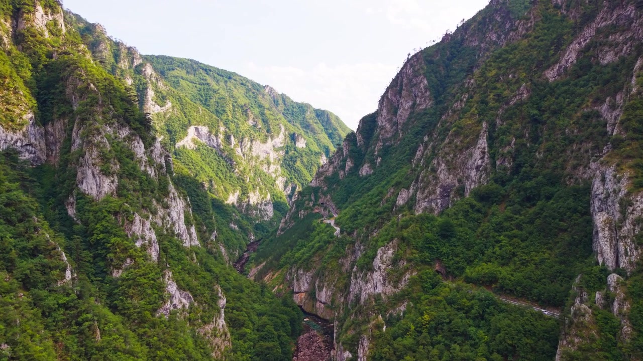 Majestic aerial view of the steep forested cliffs along Piva River canyon near Montenegro and Bosnia border