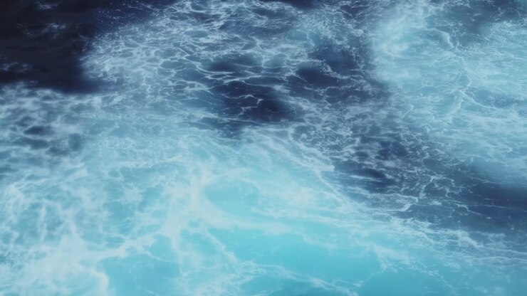 Sfondo di acqua oceanica blu agitata con onde mosse. Astratto di mareggiata durante un viaggio in nave da crociera che attraversa il Passaggio di Drake, un oceano pericoloso che causa il mal di mare.