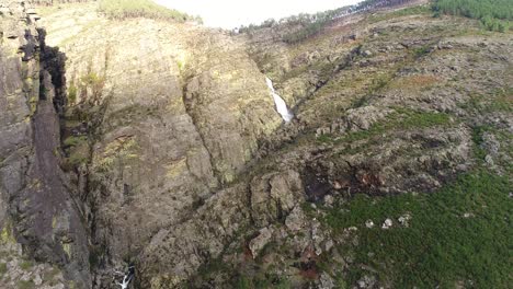 Fisgas-de-ermelo-waterfall-drone-aerial-view-in-Mondim-de-Basto,-most-beautiful-in-Portugal