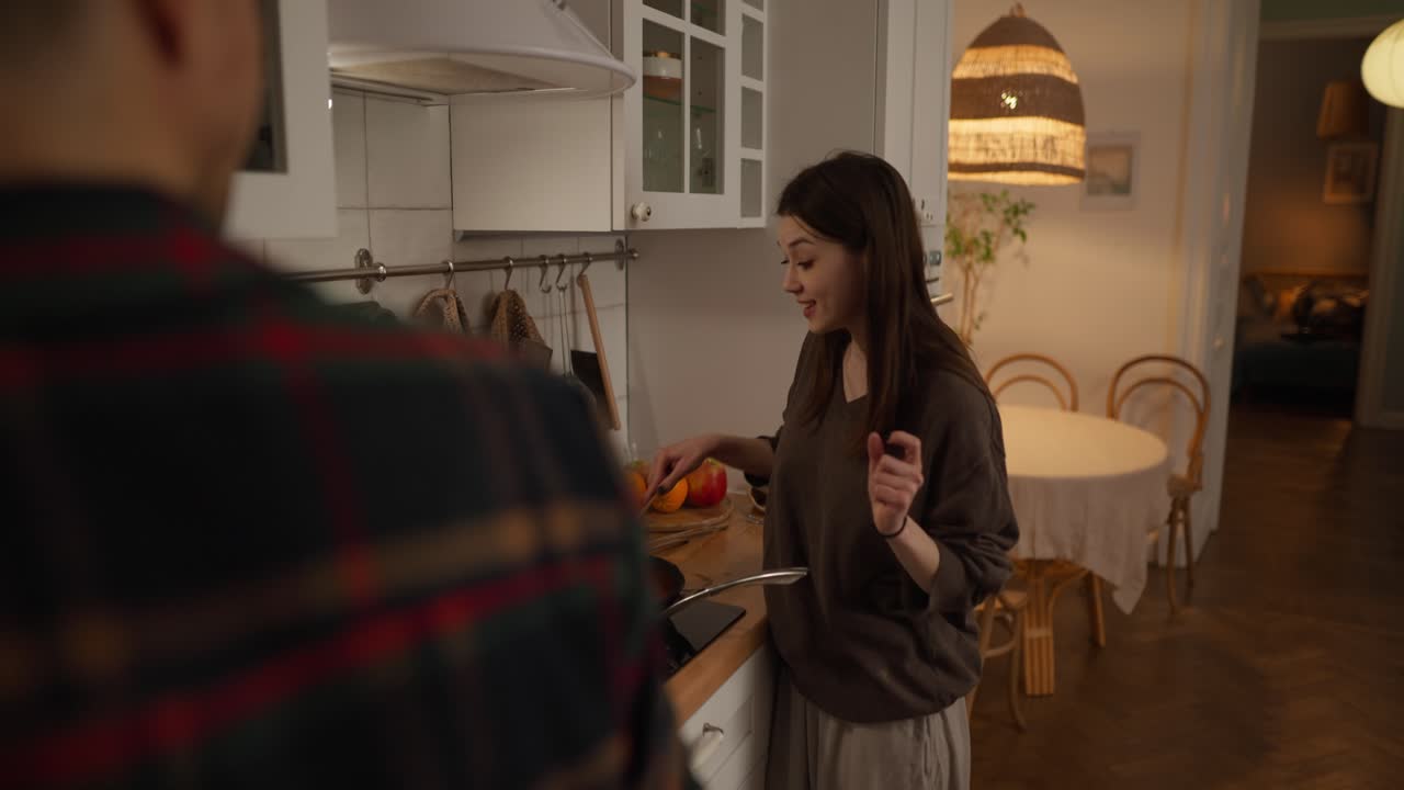 A couple in the kitchen