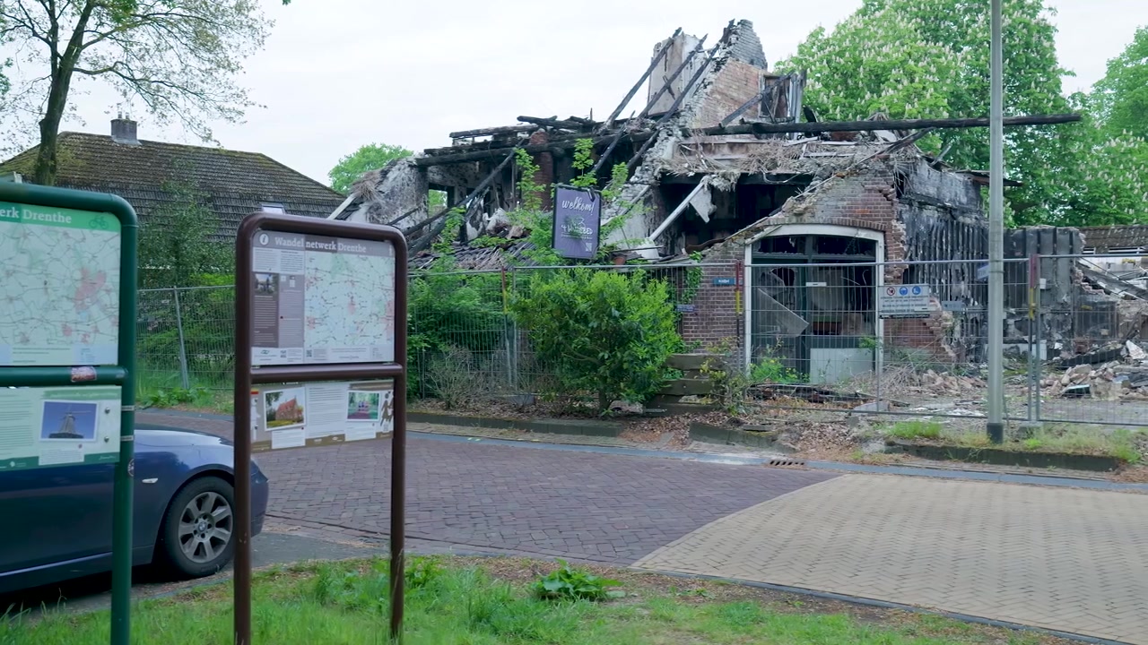 Ruins of a Burned Down Building in a Residential Area