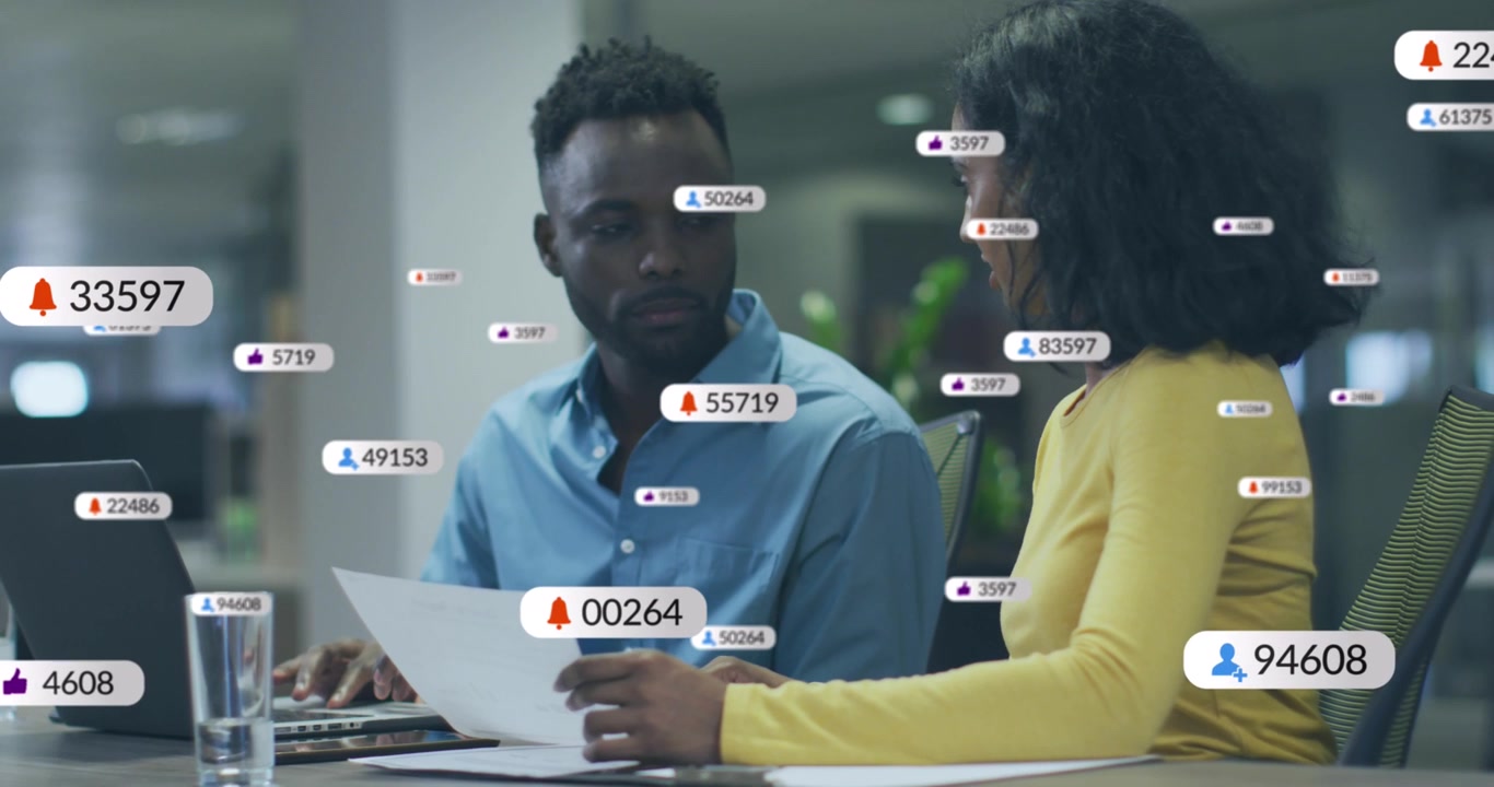 Woman showing paper, sparking man checking laptop for review, badges appearing and clustering