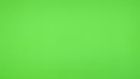 shiny soap bubbles flying from left to right in front of green screen background 4k 3840x2160 ultrahd video - bubbles of soap falling in front of greenscreen 4k 2160p uhd video