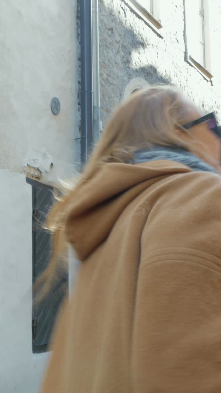 People taking photos in an old city